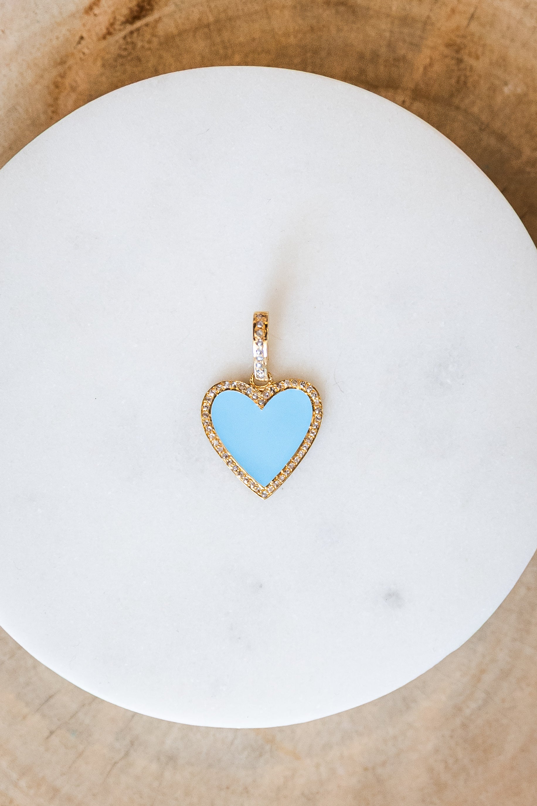 c103- small enamel heart baby blue/brass